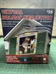 Mr. Christmas Indoor Virtual Holiday Projector 14 Loaded Videos Animated Tested. Fixed Price $34.95.