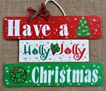 One-piece Slatted Sign Have Holly Jolly Christmas Wall Art Door Hanger Plaque. Fixed Price $13.99.