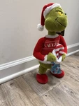 12 3/4" Animated Grinch Holding Candy Cane Plush W/ Sound Indoor Christmas Decor. Fixed Price $27.00.