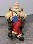 House Lloyd Christmas Around The World Coffee Break Claus Incense Burner. Fixed Price $34.99.