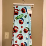 Sesame Street Blue Elmo Blanket Santa Hat Snow Ornament Nwt. Fixed Price $50.00.
