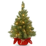 Prelit Artificial Mini Christmas Tree Includes Small Lights And Cloth Bag Base. Fixed Price $44.45.