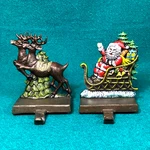 2 Lulu Decor Cast Iron Christmas Stocking Holder Hanger Reindeer Santa Sleigh. Fixed Price $39.79.