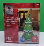 Home Accents Holiday 6FT 6IN Led Tree With 2 Gift Boxes. Fixed Price $70.00.
