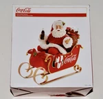 Kurt Adler (#CC5202) Coca-cola Santa In Sleigh Tabletop Christmas Decoration. Fixed Price $75.00.