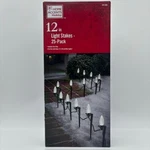 Home Accents Holiday Universal Christmas 12" Light Stakes Lawn Yard - Pack Of 25. Fixed Price $12.96.
