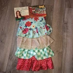 The Pioneer Woman Retro Holiday Floral Ruffle Christmas Tree Skirt 48" New. Fixed Price $29.99.