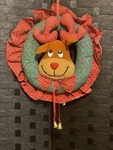 Reindeer Hanging WREATH-13 1/2" Round Lights & Christmas Songs/ Motion Sensor. Fixed Price $22.99.