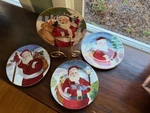 4 New Santa Plates 8" American Atelier Porcelain Christmas. Fixed Price $15.00.