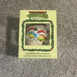 1990 Tmnt Teenage Mutant Ninja Turtles Satin Ornament International Silver Co.. Fixed Price $25.00.