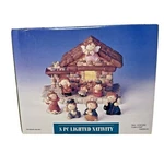 New 8 Piece Lighted Nativity Set #201052 Ceramic Child Like Figures In Box. Fixed Price $34.99.