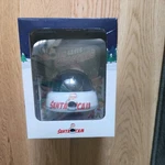 Santa Simulated Camera With The Saves Christmas Book.new. Fixed Price $11.00.