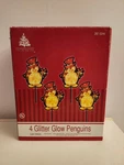 Enchanted Forest Glitter Glow Holiday Penguins Set Of 4 Lawn Stakes. Fixed Price $12.35.