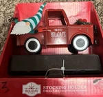 Holiday Time Vintage Red Truck Hauling Elf Gnome Metal Christmas Stocking Holder. Fixed Price $25.00.