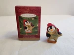 Gold-star Teacher Hallmark Ornament 2000 Penguin Holding. Fixed Price $8.99.
