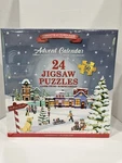 Eurographics Christmas Town Fair Advent Calendar Jigsaw 24 Puzzles. Fixed Price $19.00.