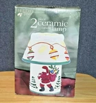 Holiday Time Candle 2 Piece Ceramic Lamp Model 66631 Santa Clause. Fixed Price $14.00.