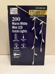 Home Accent Holiday Steady Lit 200 Warm White Mini Led Icicle Lights, 17.5 Ft.. Fixed Price $23.74.