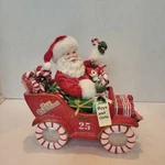 Kurt S. Adler 8.5-INCH Fabrich Musical Candy Car Santa, Multi. Fixed Price $99.99.