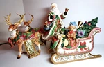Kirklands Signature Santa Claus Sleigh 2 Reindeer Candle Holder Centerpiece Figs. Fixed Price $69.95.