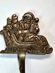 Grandeur Noel Cast Iron Christmas Stocking Holder Santa His Sleigh 7"X6" 3LBS. Fixed Price $34.75.
