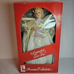 Vintage Santas Best Porcelain Christmas Angel Animated Lighted Tree Topper. Fixed Price $19.99.