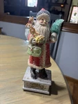 Merry Christmas Santa W/ Toys Sparkle & Brush Tree Tinsel Hat Figurine 9 Tall. Fixed Price $12.99.