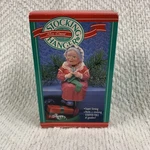 1988 Hallmark Mrs. Santa Claus Knitting 5" Stocking Holder Hanger Grandma Unused. Fixed Price $18.00.
