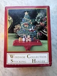 Windsor Collection Christmas Tree Stocking Hanger Iron Base Resin 5". Fixed Price $24.00.