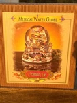Grandeur Noel 1999 Musical Water Globe Santa Workshop Collector Edition. Fixed Price $99.95.