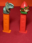 Lot Of 2 Christmas Themed Pez Dispenser Elf W/ Feet & Jurassic Park Dinosaur. Fixed Price $9.99.