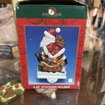 Kurt Adler Christmas Stocking Holder Hanger Hook Resin Santa And Sleigh. Fixed Price $34.99.