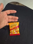 Flamin' Hot Crunchy Cheetos Collectable Novelty Christmas Ornament. Fixed Price $12.00.