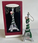 1995 Hallmark Santa In Paris Joyeux Noel Eiffel Tower Christmas Ornament Lsx. Fixed Price $13.95.