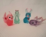 Set Of 4 Target Bullseye Valentine Mythical Animals Glitter Figurines Toys. Fixed Price $13.49.