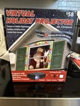 Mr Christmas Virtual Holiday Window Projector With Tripod And Remote. Fixed Price $34.99.