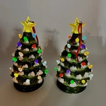 2 Ceramic Christmas Light Up Tree Green Retro Holiday Battery Operated 6.5 Inch. Fixed Price $25.60.