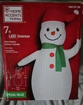 Home Accents Holiday 7-FOOT Led Snowman Christmas Inflatable. Fixed Price $32.99.