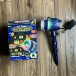 Star Shower Laser Magic Light Projector 6 Images, 4 Christmas 2 Halloween. Fixed Price $18.89.