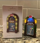 Hallmark Keepsake Swingin Into Christmas Ornament Magic Light & Sound 2008. Fixed Price $17.87.