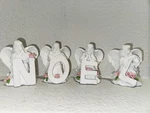 Noel 4 Piece Angels With Flowers Set Christmas Vintage Figurine Holiday Decor. Fixed Price $7.00.