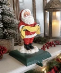 Two - Potpourri 1992 Christmas Stocking Hangers Holder Santa Peace Cast Iron. Fixed Price $22.00.