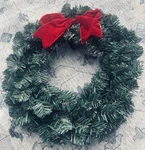 Artificial Pre-lit Balsam Pine Christmas Wreath With Red Bow 16 Battery Timer. Fixed Price $15.50.