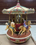 Mr. Christmas Vintage Decorative Holiday Merry Go Round Music Box Carousel. Fixed Price $36.99.