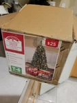 Holiday Time 4-FOOT Pre-lit Indiana Spruce Clear Lights Christmas Tree. Fixed Price $54.00.