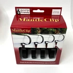 The Original Mantle Clip Christmas Stocking Decor Holders Black Metal Four. Fixed Price $12.95.
