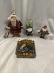 Lot Of 4 Christmas Figurines Santas Fishing And Lake Ornaments Various Sizes.. Fixed Price $18.00.