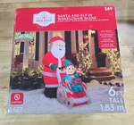 Christmas Holiday Time 6 Ft Santa And Elf Wheelchair Airblown Inflatable. Fixed Price $189.95.