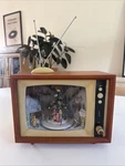 2010 Roman 8 X10 Musical Tv Box Animated Carol Christmas Tree With Lights. Fixed Price $129.50.