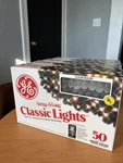 Vintage String-a-long Classic 50 Clear Indoor Outdoor Christmas Lights. Fixed Price $80.00.